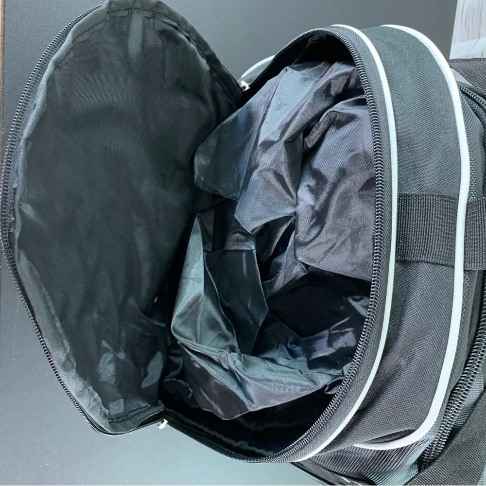 A Black 100th Anniversary Duffel Bag (Masonic?).